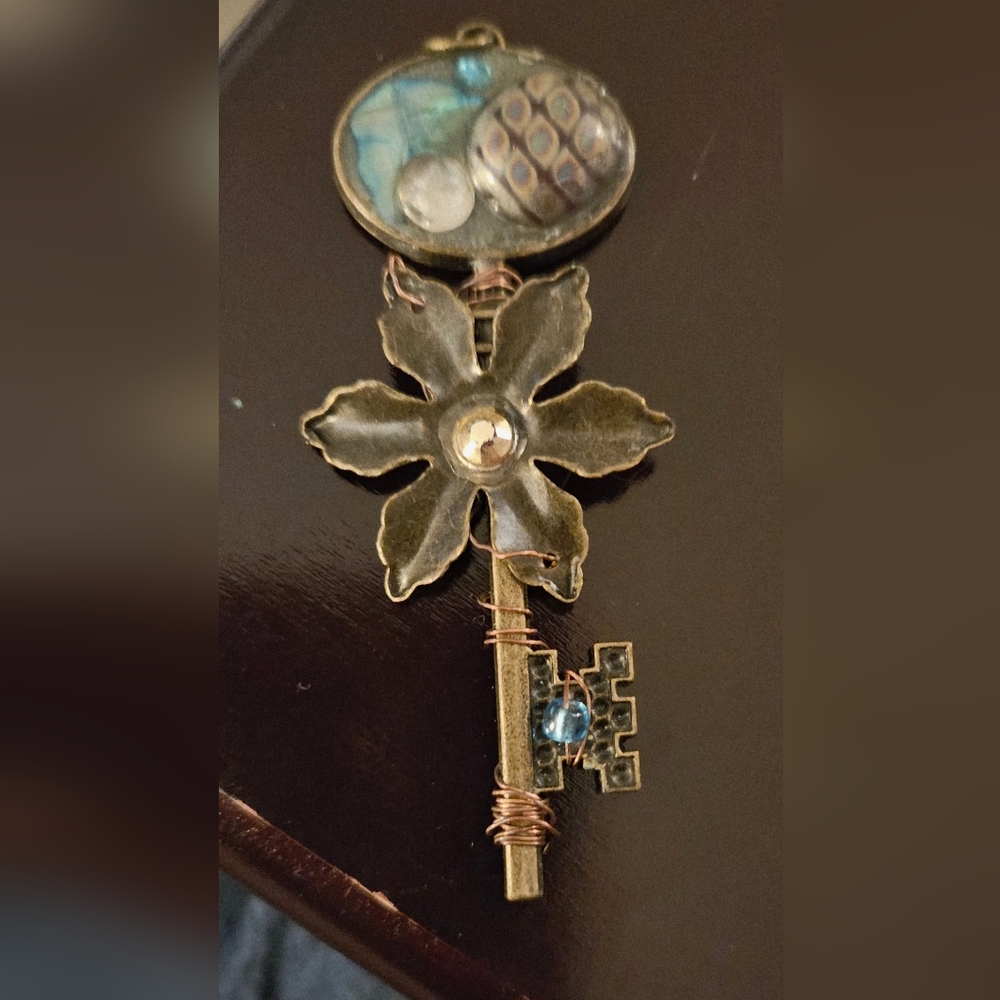 Unique Brass and Blue Key Pendant